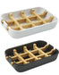 White and black draining soap dishes with raised bamboo slats designed to keep handmade soap bars elevated and dry between uses.
