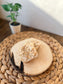 Mini handmade oatmeal and honey soap bars topped with rolled oats, sized for hand washing or gifting.